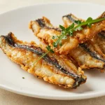 Deliziosa anguilla cotta nella friggitrice ad aria per un pasto gustoso e leggero.
