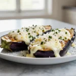 Deliziose melanzane ripiene cucinate in friggitrice ad aria.