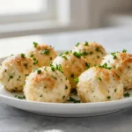 Deliziose polpette di ricotta cotte in friggitrice ad aria.